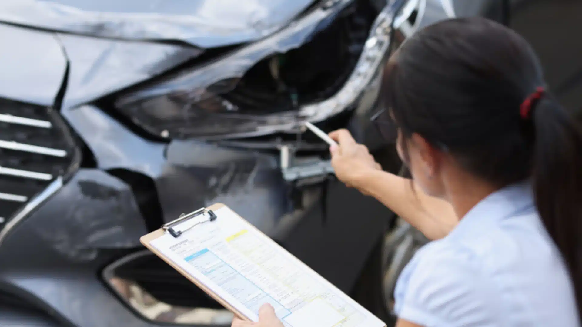 Multi-vehicle accident lawyer reviewing crash details with injured clients